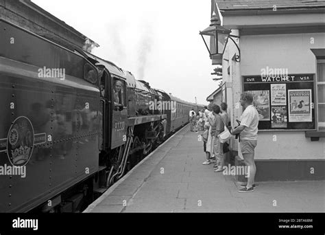 Passengers at Watchet station on the West Somerset Heritage Railway ...