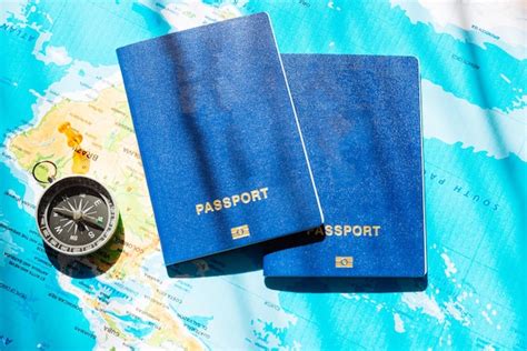 Premium Photo Travel Concept Two Passports With Compass On World Map