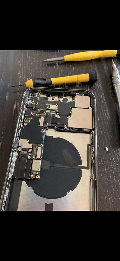 This is a gold iPhone 14 pro max in the deep purple housing. Phone