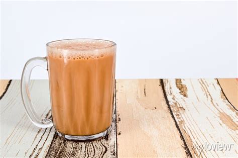 Teh Tarik Or Pulled Tea Is A Famous Sweet Milk Tea In Malaysia Posters