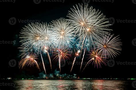 Amazing Beautiful Colorful Fireworks Display On Celebration Night Showing On The Sea Beach With