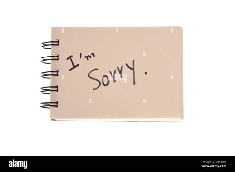 Say sorry with a text message on paper Stock Photo - Alamy