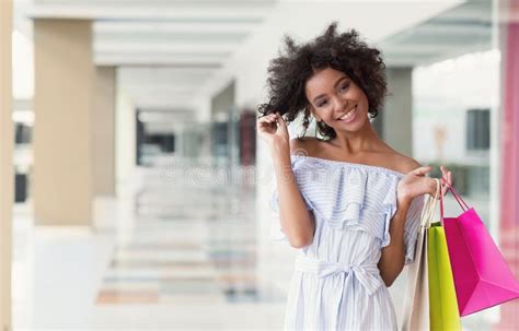 Happy Attractive African American Shopper In Shopping Mall Stock Image