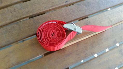 how to put together a tie down strap