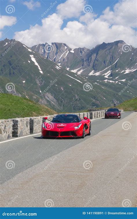 Two Red Ferrari Take Part In The Cavalcade 2018 Event Along The Roads