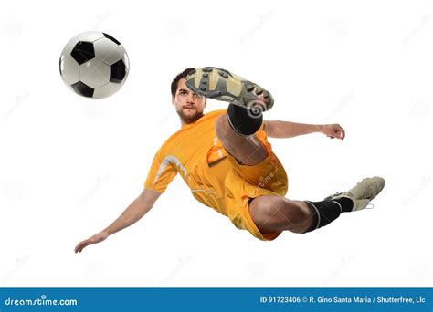 Soccer Player Kicking Ball in Midair Stock Photo - Image of competition ...