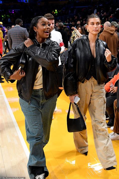 Hailey Bieber And Justine Skye Coordinate While Sitting Courtside At