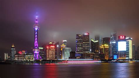 Shanghai Skyscrapers by River at Night · Free Stock Photo