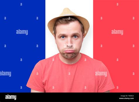 Sad Tourist Man On French Flag Background Stock Photo Alamy