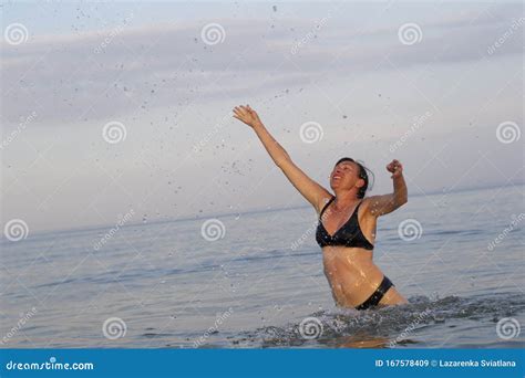 Woman In Sea Water With Splashes Stock Image Image Of Elderly