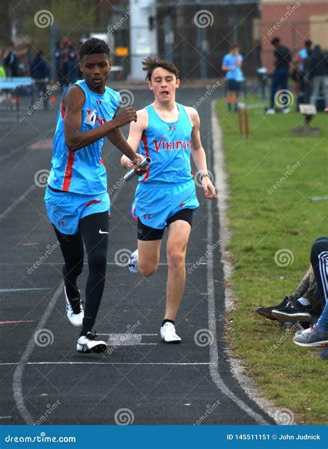 High School Track Meet, 3000 Meter Relay Editorial Photo - Image of ...