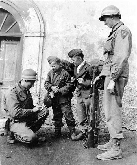 Two Us Army Mps Are Slightly Amused Interrogating Two German Grade