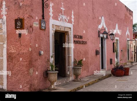 Painted Spanish Colonial Buildings On The Calzada De Los Frailes In