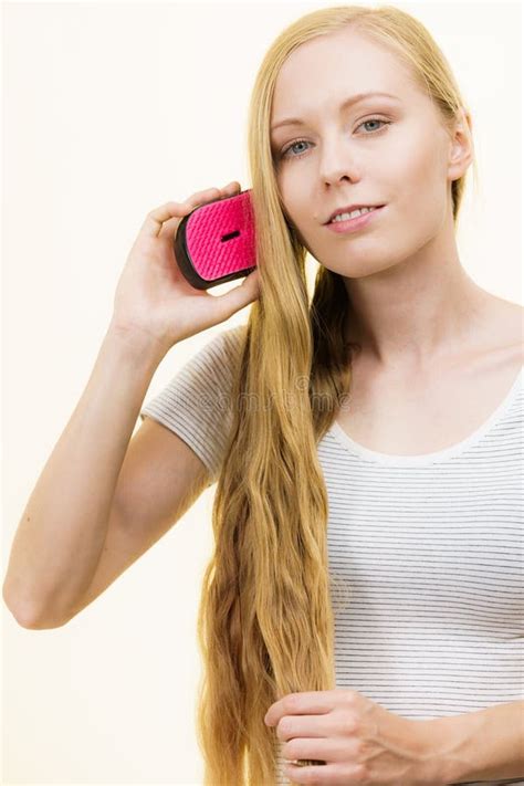 Blonde Girl Brushing Her Long Hair Stock Photo Image Of Haircare Long