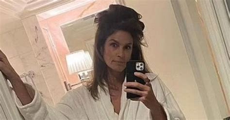 Cindy Crawford Shows Off Endless Legs Under White Bathrobe For Racy