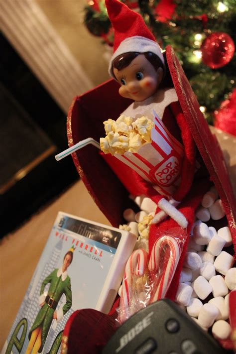 elf on a shelf : watching the movie Elf | Elf fun, Xmas elf, Christmas elf