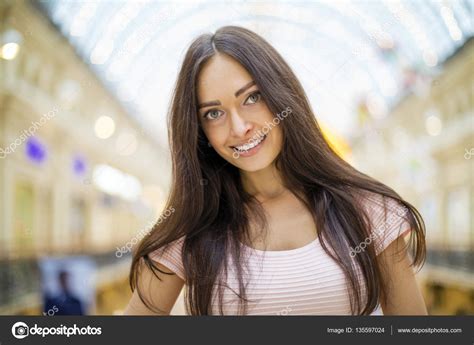 Beautiful Brunette Woman In Pink Dress Stock Photo Arkusha 135597024