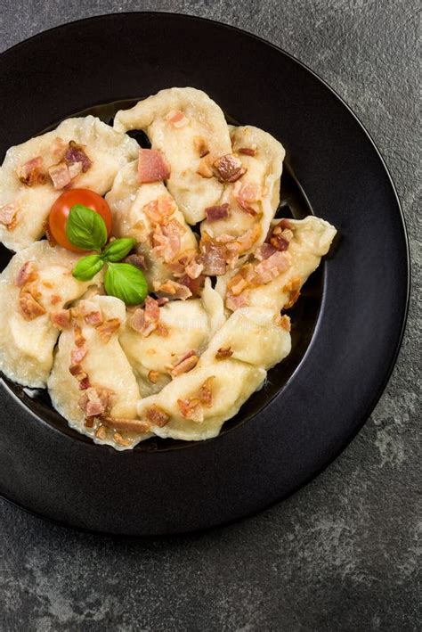 Traditinal Polish Meat Dumplings Served On Plate In Restaurant Stock