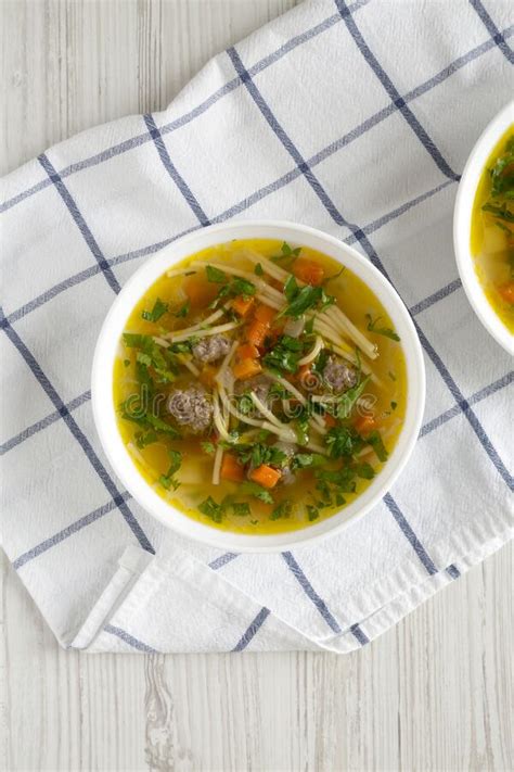 Homemade Sopa A La Minuta In White Bowls On A White Wooden Background