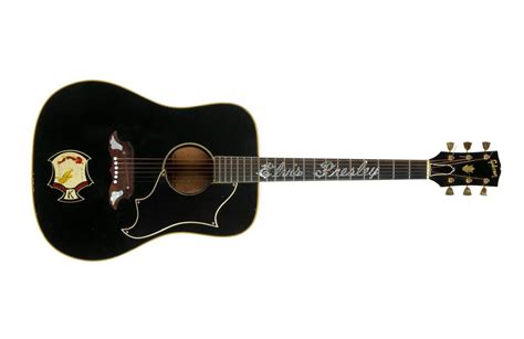 La guitare fétiche d Elvis vendue 334 000 dollars aux enchères rts ch