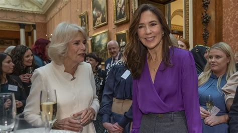 Queen Consort Camilla Greets Princess Mary Of Denmark At Gathering To