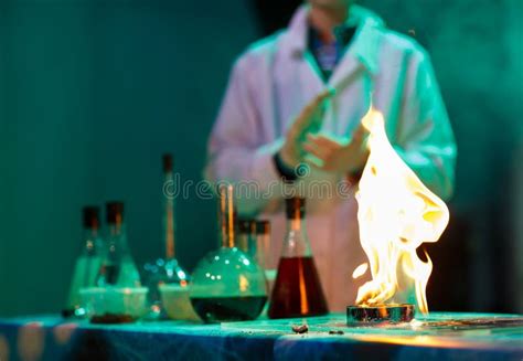 Experiments in a Chemistry Lab. Conducting an Experiment in the Laboratory Stock Image - Image ...