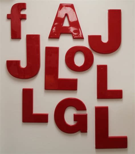 FOUND in ITHACA » Red Plastic Advertising Letters