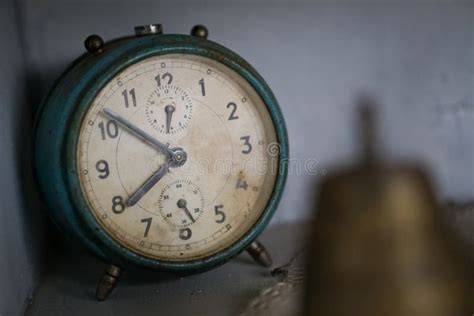 Old Dark Green Vintage Alarm Clock with Rust in Corner of Old Locker Stock Image - Image of time ...