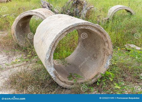 Cracked Old Sewer Pipe Located In Local River With Wastewater Coming