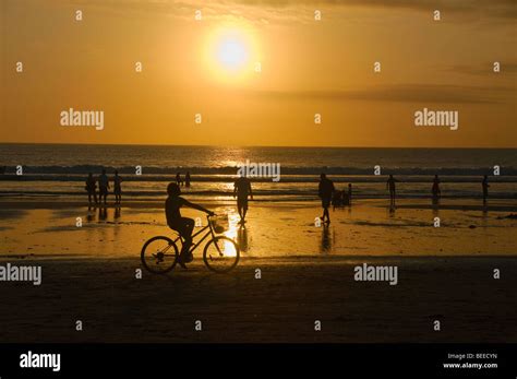 Enjoying The Sunset On Kuta Beach In Bali Indonesia Stock Photo Alamy