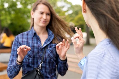 Free Photo Adult Women Communicating Through Sign Language