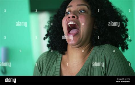 A Black Latina Woman Shocking Reaction With Open Mouth Stock Photo Alamy