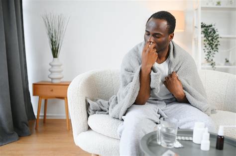 Premium Photo Cold And Flu Treatment Sick African American Man Using