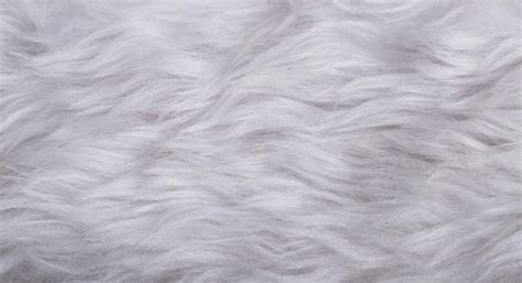 Premium Photo | White faux fur fabric by the yard