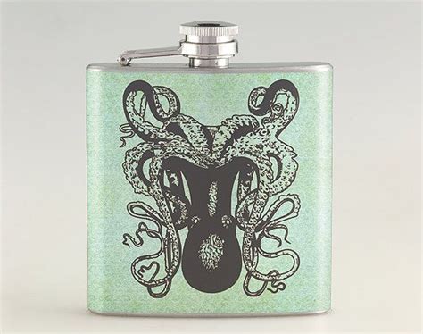 A Green Flask With An Octopus On It