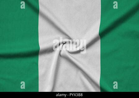 Nigeria Flag With Big Folds Waving Close Up Under The Studio Light