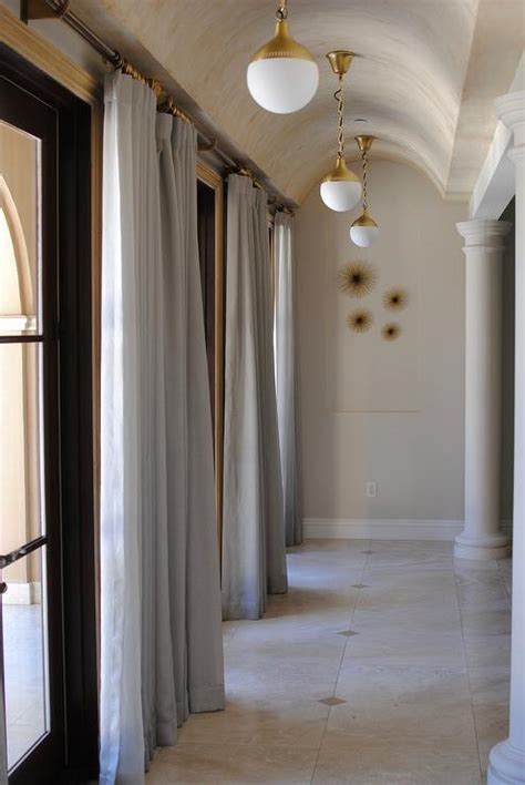 Hallway Barrel Ceiling With Brass Pendant Lights Transitional