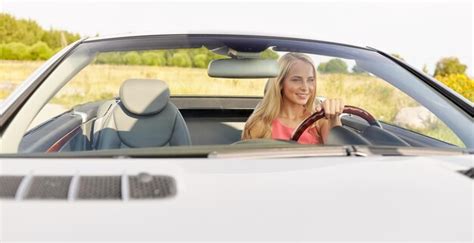 Premium Photo Travel Road Trip And People Concept Happy Young Woman Driving Convertible Car