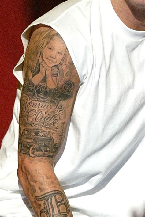 Eminem’s Upper Sleeve Tattoo: The Daughter and Bonnie and Clyde ...