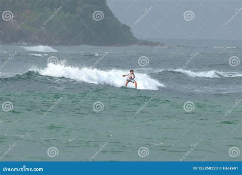 Surfing The Waves Of Koggala Beach In Sri Lanka Editorial Stock Photo