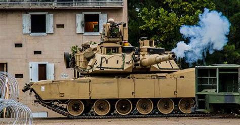 An M1A2 Main Battle Tank Fires A Simulated Tank Round PICRYL Public