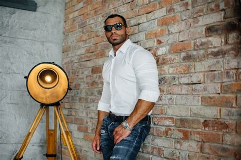 Premium Photo A Sexy Athlete With A Naked Torso Is Wearing Glasses Rest Healthy Lifestyle