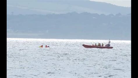 Calshot Rnli Rescue Kite Surfer In Difficulty Within Sight Of Shore Rnli