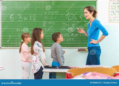 Teacher And Student At The Blackboard, Math Class Stock Photo - Image ...