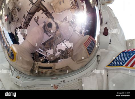 International Space Station Expedition 35 Astronaut Chris Cassidy Takes A Self Portrait During A