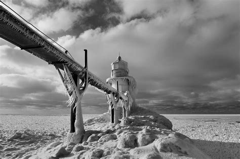 Frozen Lighthouse Lake Michigan Photograph By Dan Sproul