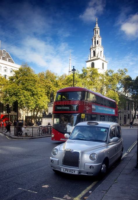 Iconic London Taxi and Red Bus at London Street in London Street ...