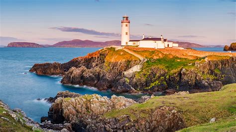 Fanad Head Lighthouse And Its Cove At Sunset County Donegal Ulster