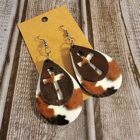 Leather Teardrop Cross With Faux Cow Hide Print On Wood Earrings