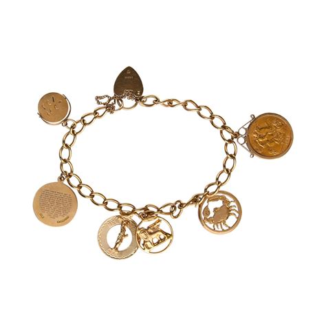 9CT GOLD CHARM BRACELET